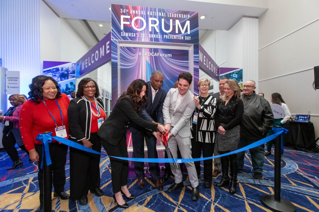 CADCA representatives cutting the ribbon to officially mark the beginning of the 34th Annual National Leadership Forum.